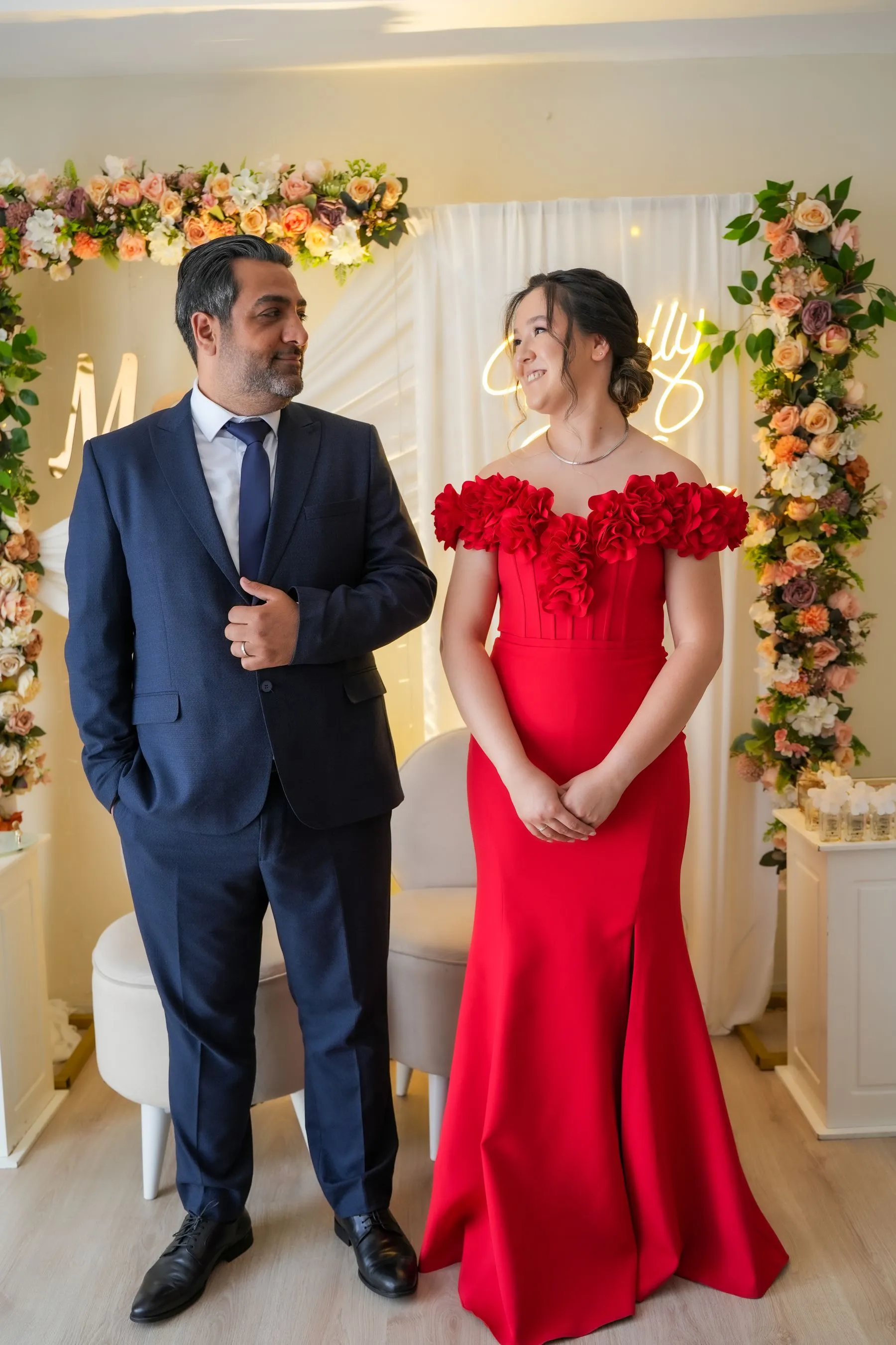 Elegantly dressed couple at a formal event
