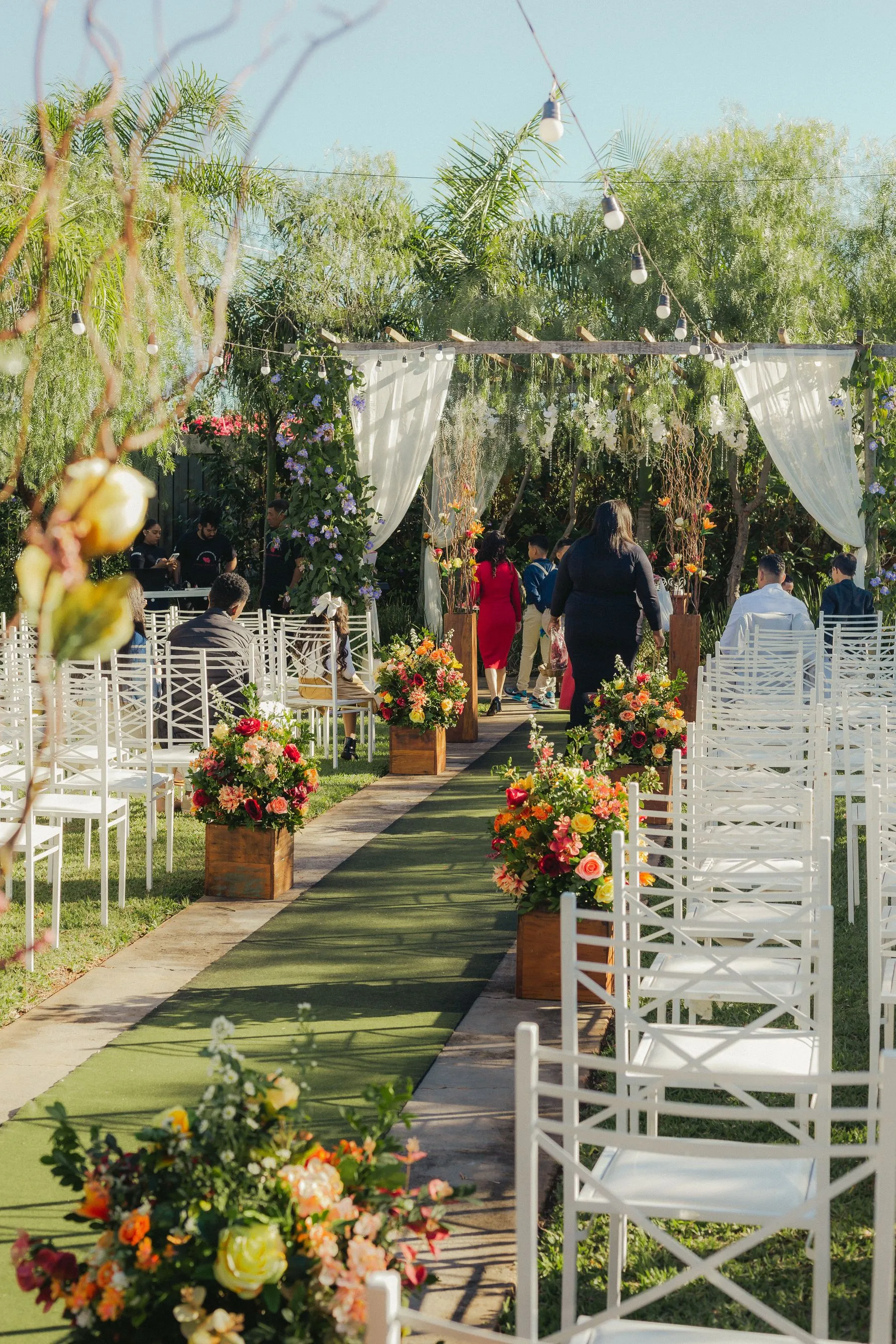 Green garden wedding aisle arranged for a ceremony