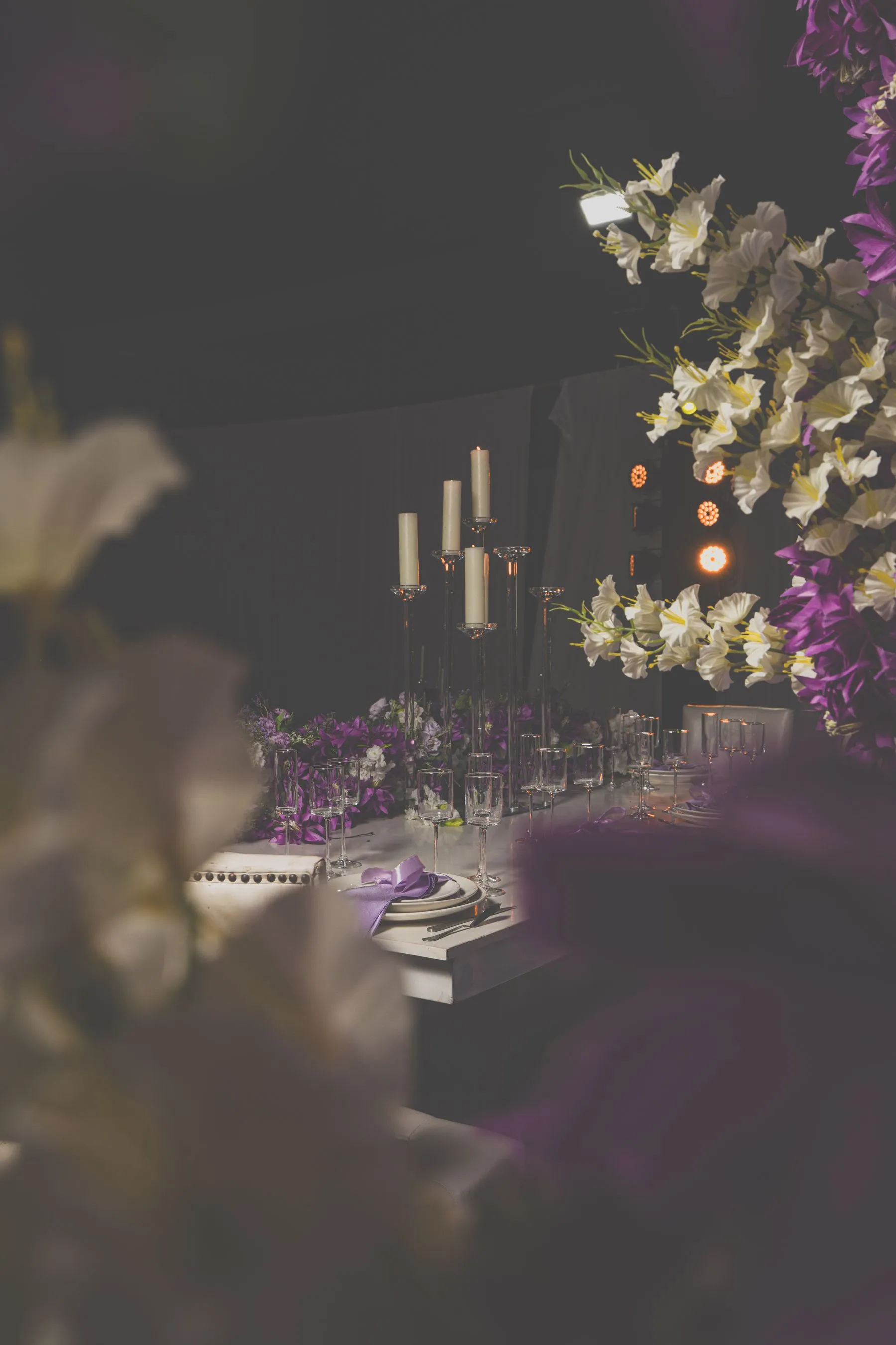 Lavender-lit gala dinner room