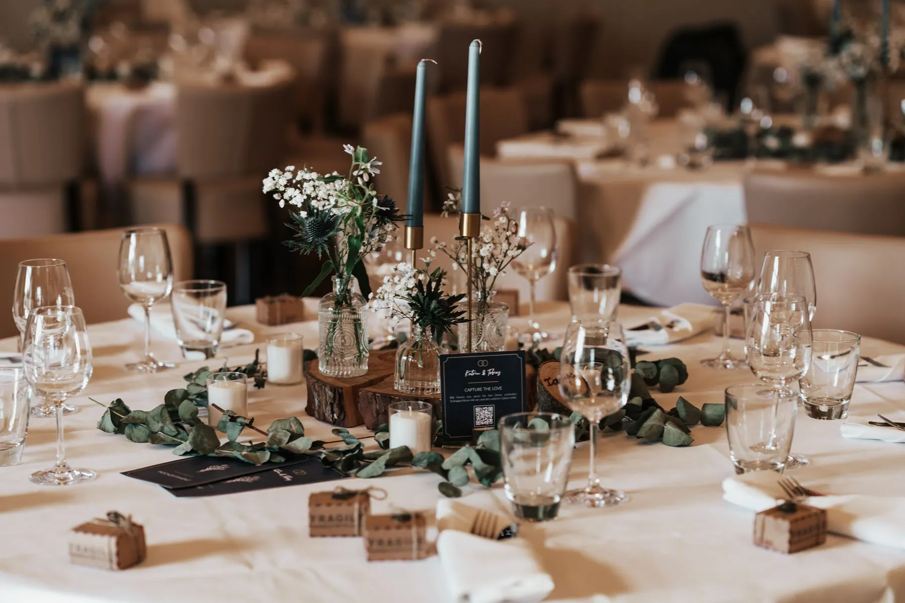 Modern private dinner table with candlelight