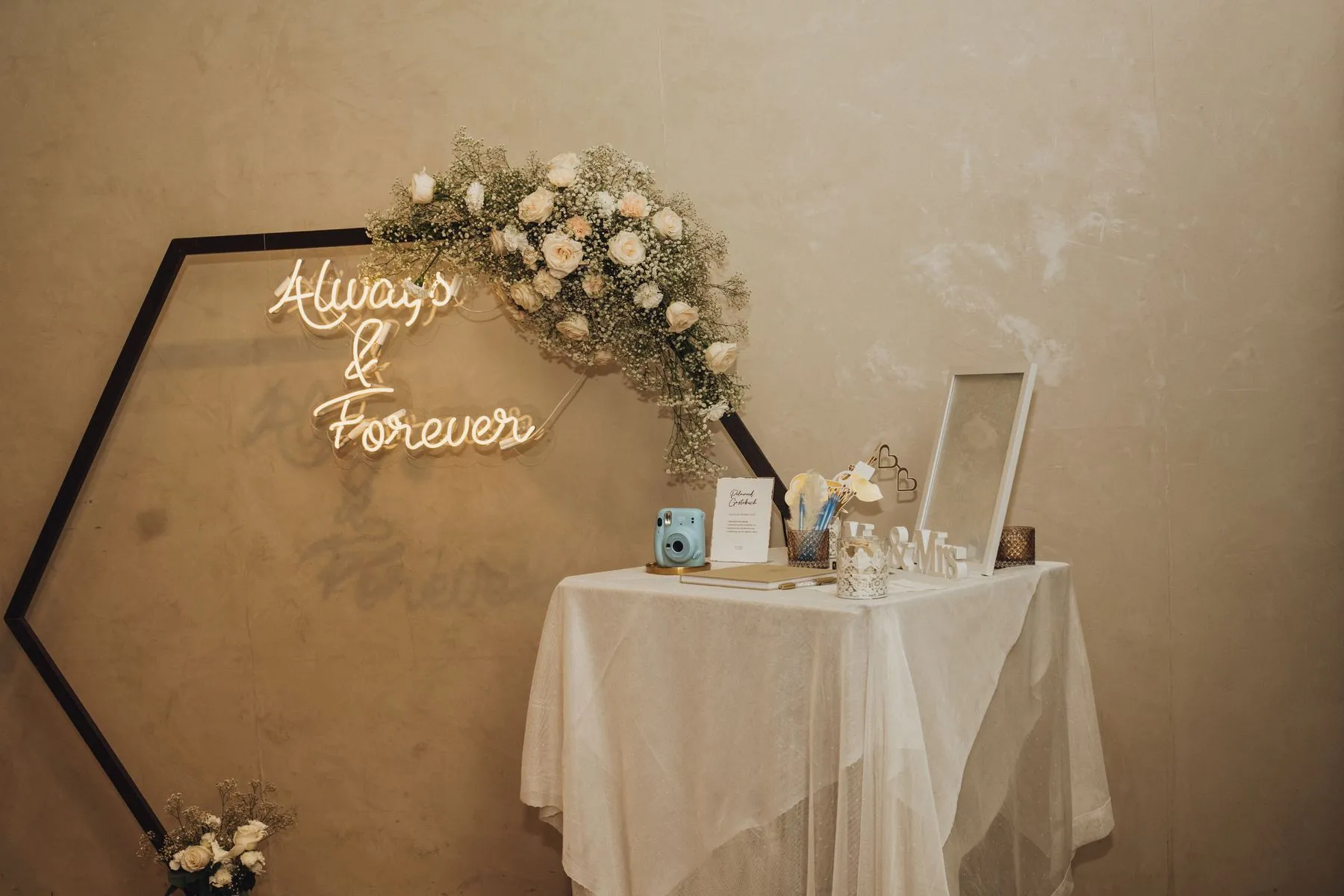 Modern reception corner with floral styling