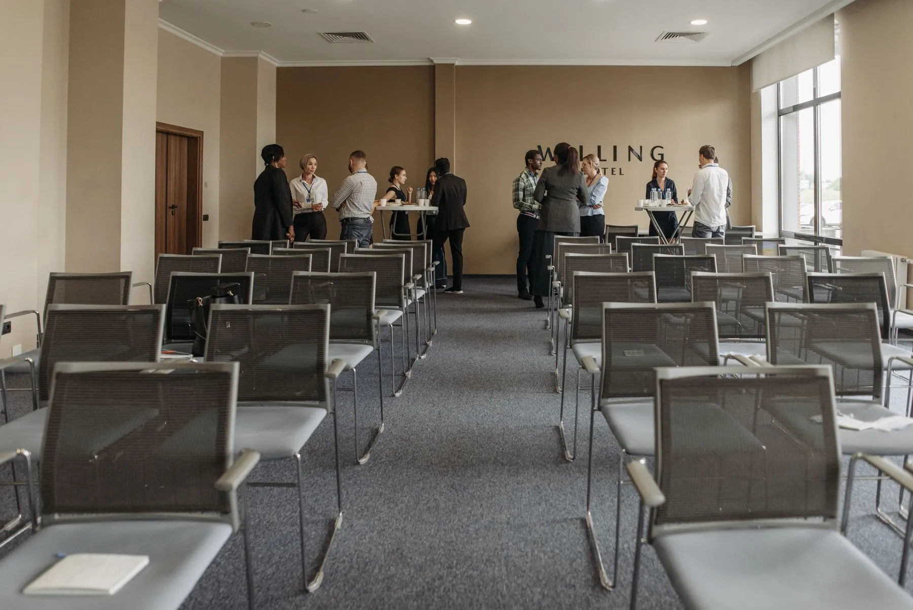 Business guests networking in a conference room