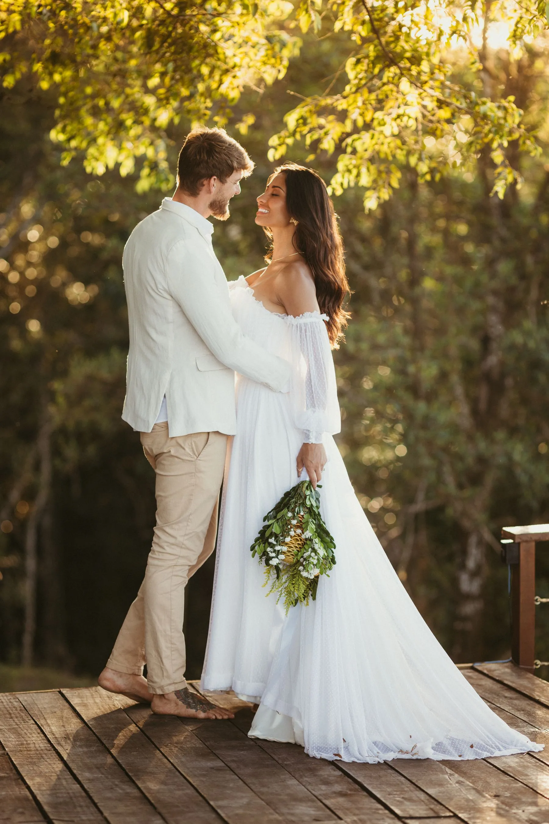 Wedding couple sharing a quiet moment outdoors