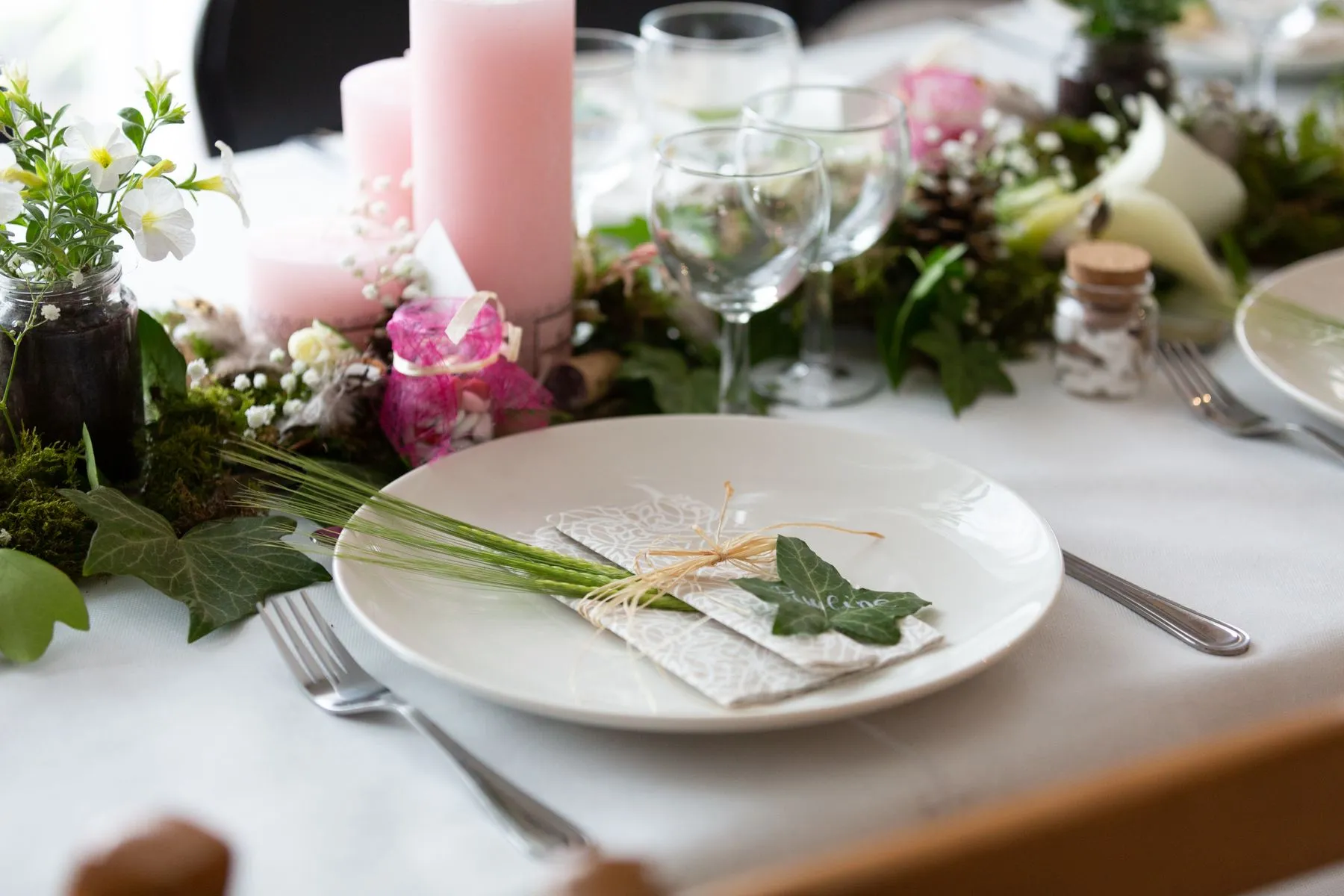 Romantic floral table setting with candles