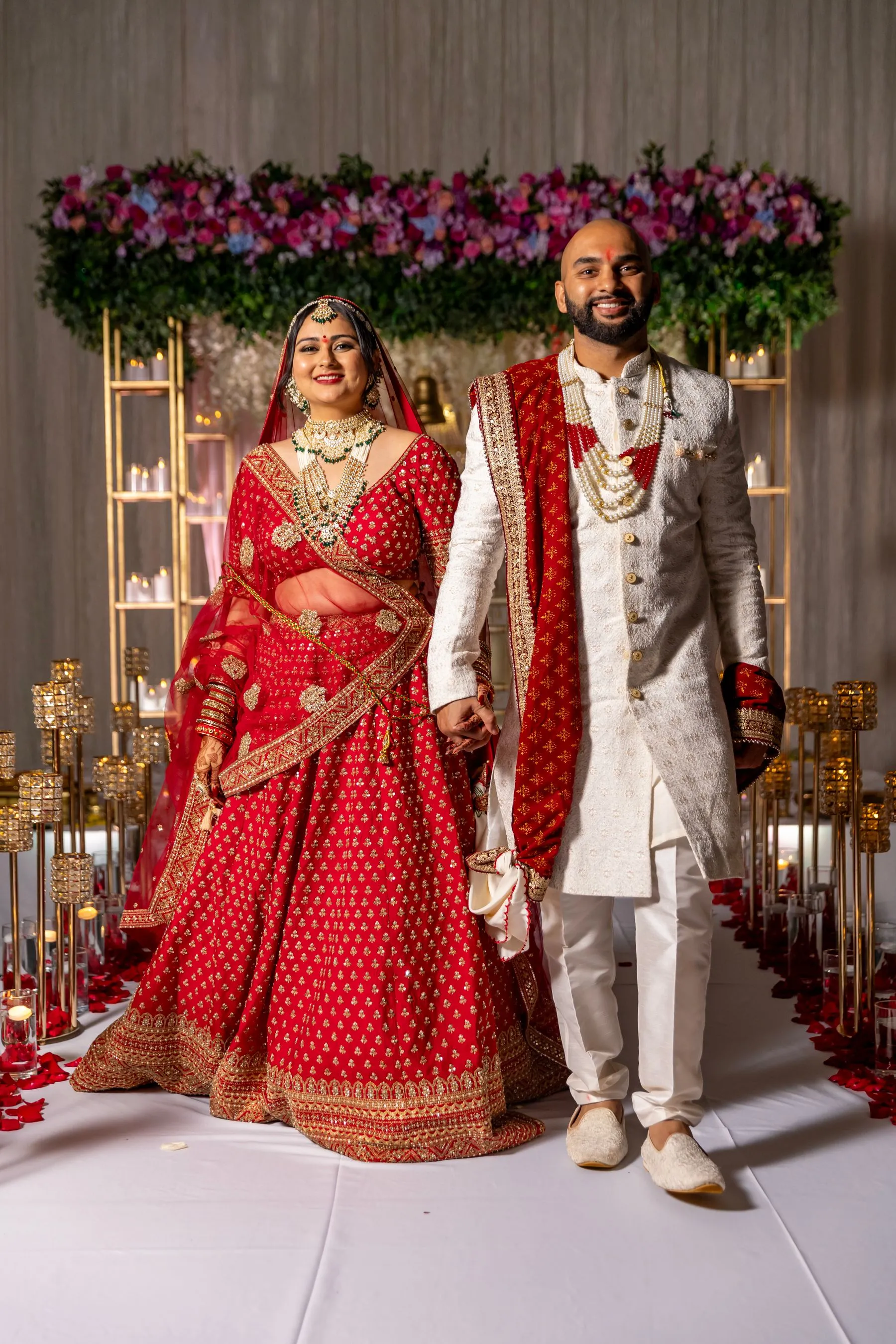 South Asian wedding aisle with colourful florals