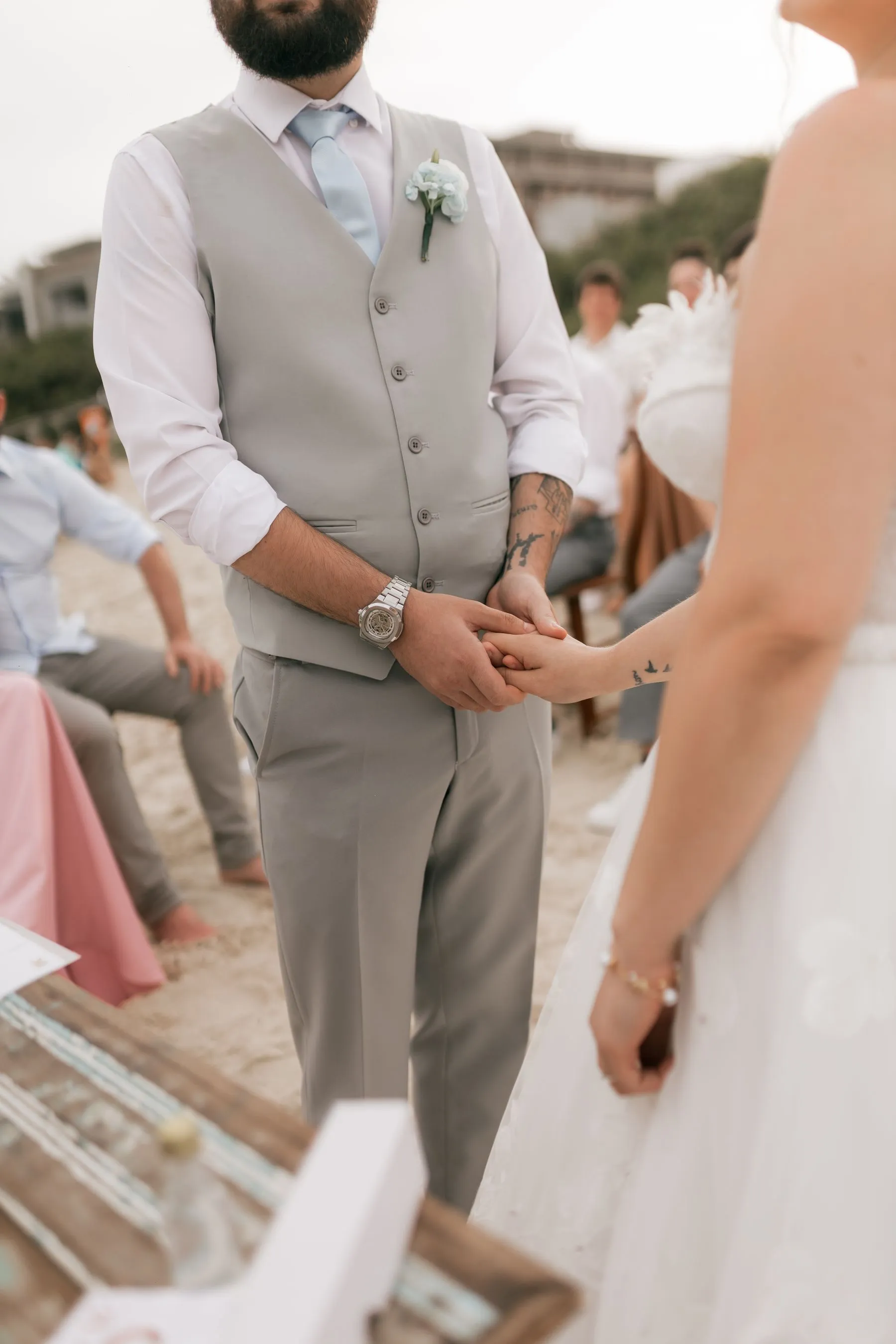 Beach wedding ceremony at sunset