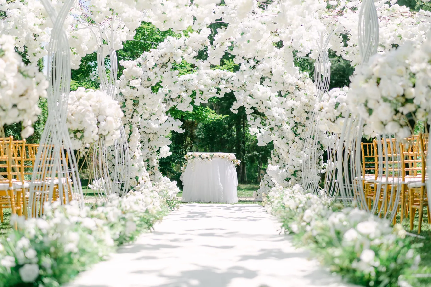 Woodland wedding ceremony surrounded by trees